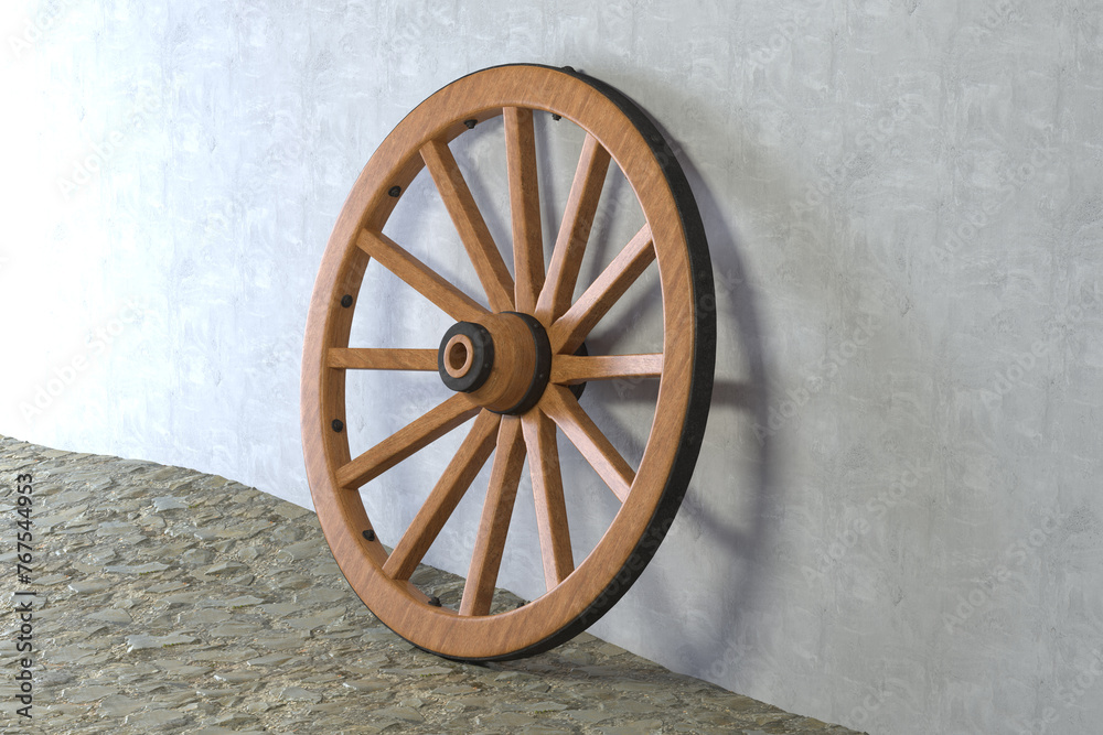 Old wooden wheel with black metal brackets and rivets