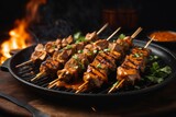 Chicken satay on the grill with sauce, delicious restaurant food menu