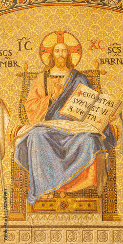 MILAN, ITALY - MARCH 6, 2024: The mosaic of Jesus the Pantokrator and Teacher in the church Basilica di San Babila by  workroom Murano-Venezia (1929).