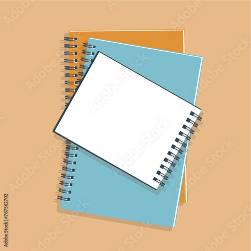 stacked notebooks over brown table background flat style top view aerial