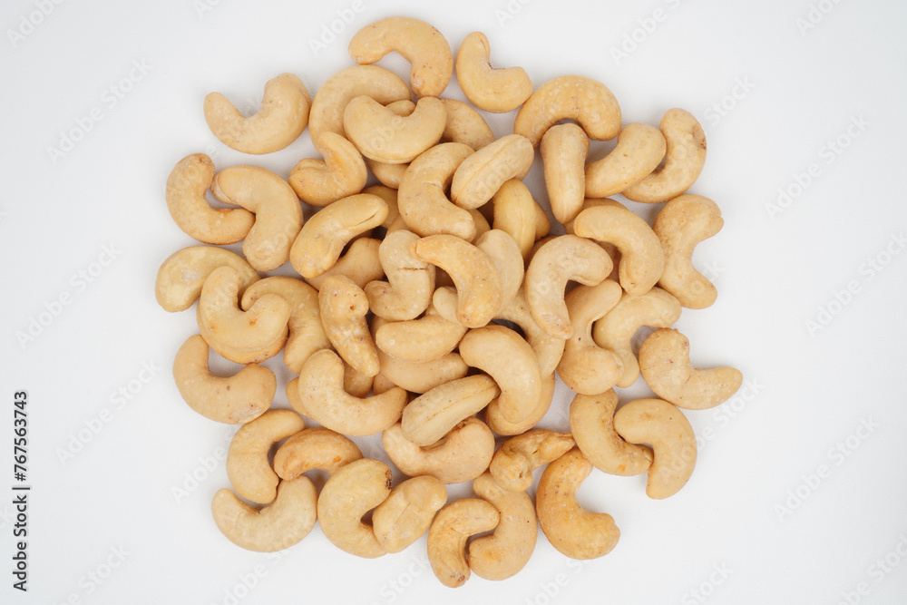 Heap of delicious cashew nuts isolated background Heap of delicious cashew nuts isolated background