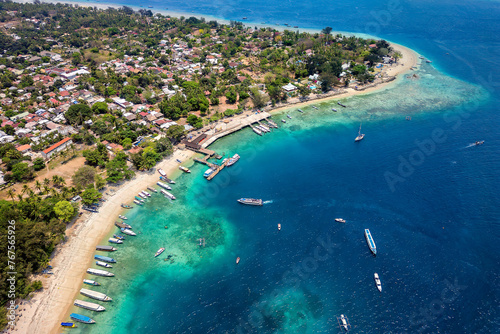 Aerial view of a port and coral reef on the coast of a small tropical island in Indonesia (Gili Islands, Lombok)
