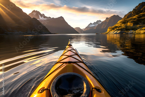 yellow kayak boat floats down the river in the fjords of Norway towards the sunset. view from myself