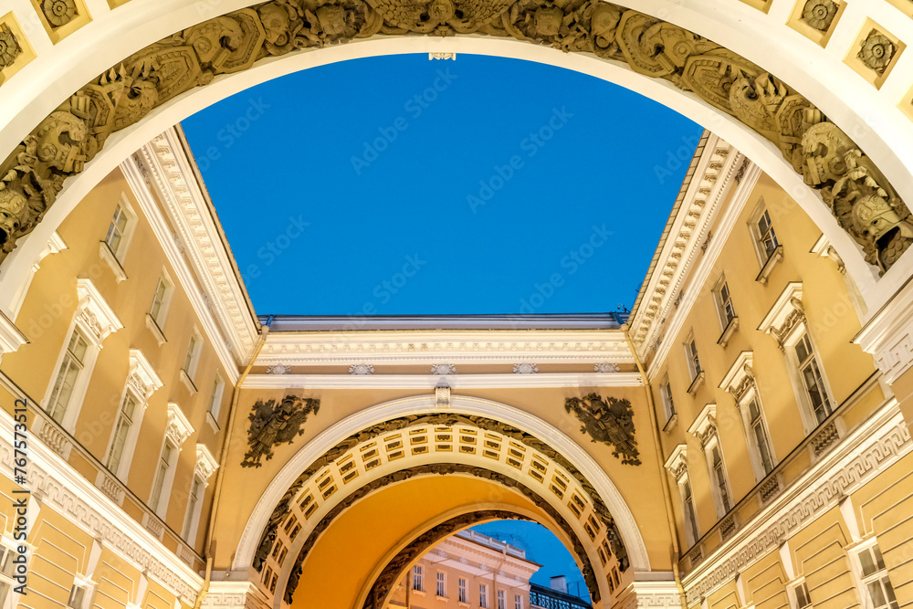 The arch of the ancient palace in the evening against the sky in St. Petersburg.