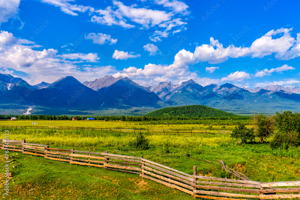 Beautiful landscape with valley and mountains on summer day. Valley of extinct volcanoes in Tunka park near Arshan village in Buryatia. Amazing nature, Eastern Sayan mountains, Siberia, Russia