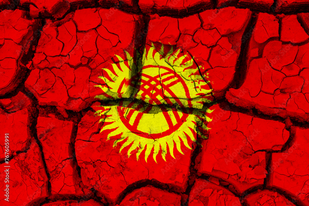Dry soil pattern on the flag of Kyrgyzstan. Country with drought concept due to climate change. Water problem. Dry cracked earth country.