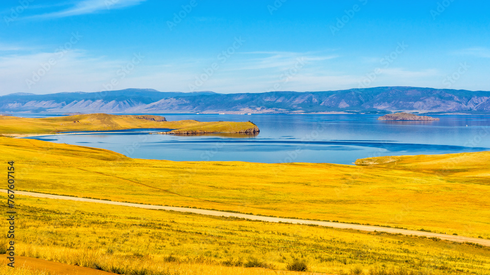View from Olkhon island to Maloe More or Small Sea of lake Baikal and mainland near Yalga village. Picturesque summer landscape, beautiful natural background. Discovering distant places of Earth View from Olkhon island to Maloe More or Small Sea of lake Baikal and mainland near Yalga village. Picturesque summer landscape, beautiful natural background. Discovering distant places of Earth