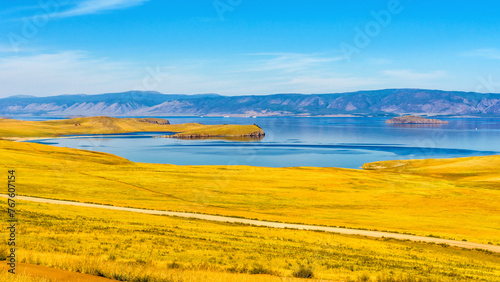 View from Olkhon island to Maloe More or Small Sea of lake Baikal and mainland near Yalga village. Picturesque summer landscape, beautiful natural background. Discovering distant places of Earth