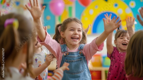 Little girl throws hands celebrating birthday