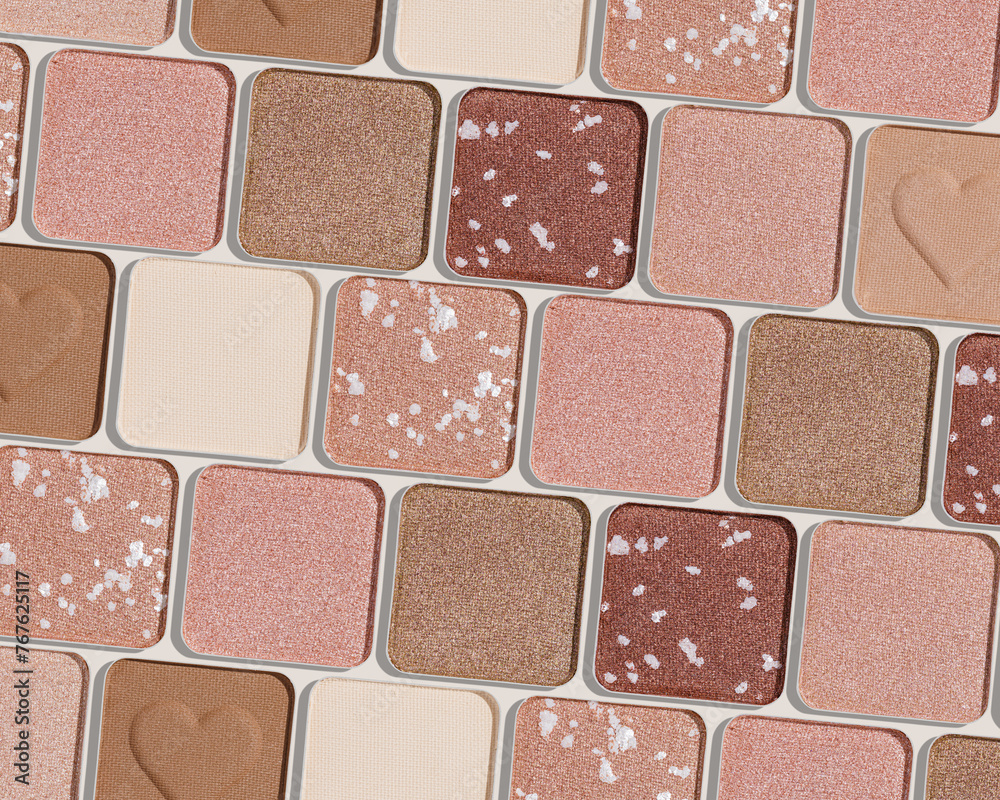 Fototapeta premium Minimal pattern of eye shadow beige tones swatches, monochrome photo background, eyeshadow with heart imprint, shiny natural shades powder makeup, square shape metal pack, beauty cosmetic texture