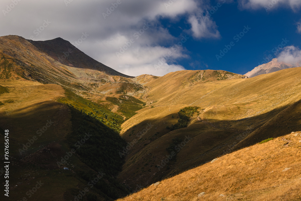 Views of Georgian landscapes in autumn mood. Mountains perfect for hiking.