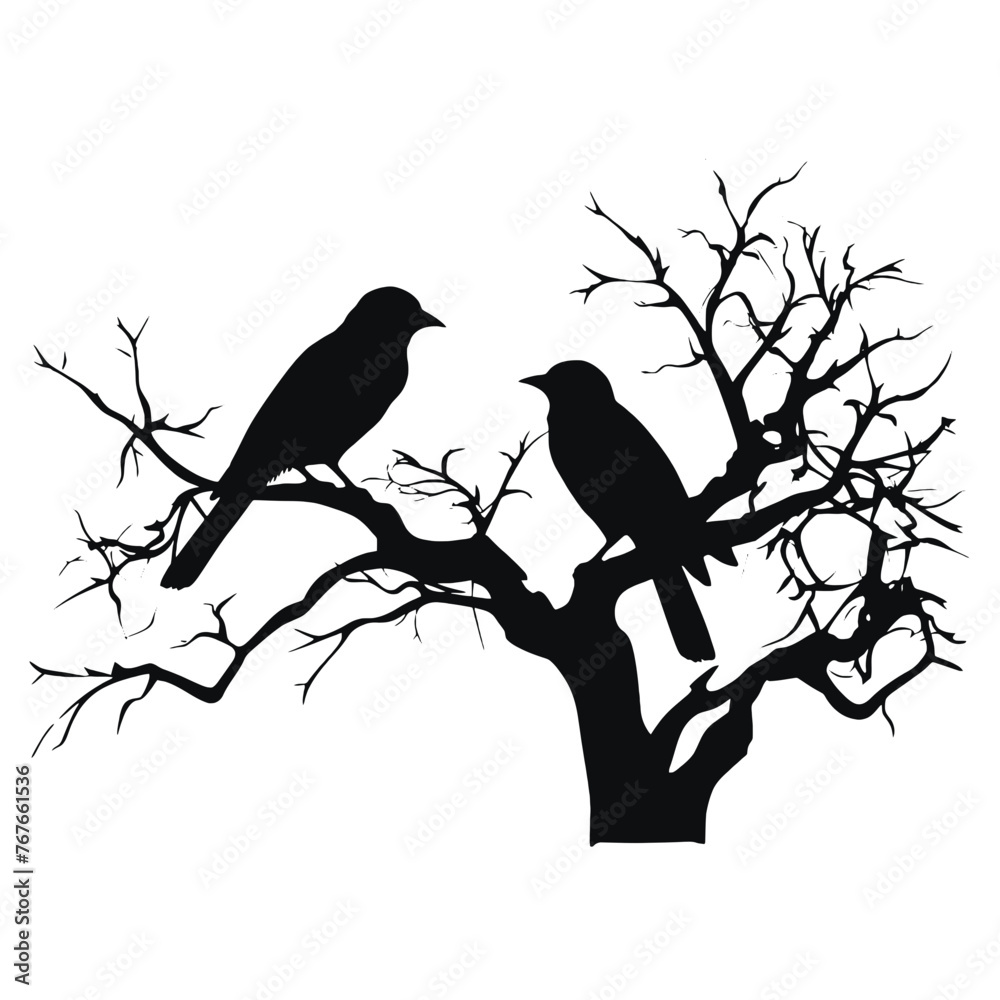 Fototapeta premium A bird sitting on top of a tree branch