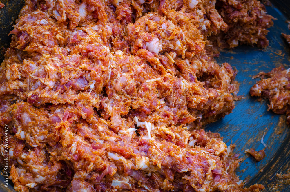 finely ground meat, prepared to make sausages, close-up details