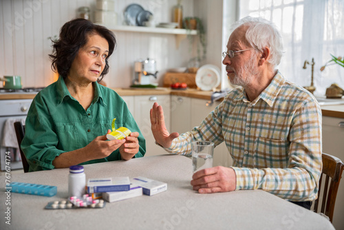 elderly man refuses to take medication at home, says no to wife