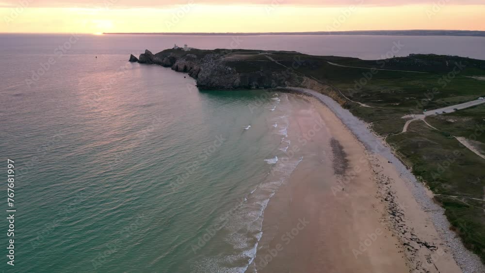 Downward Lateral Aerial View of Empty Sandy Beach and Ocean Downward Lateral Aerial View of Empty Sandy Beach and Ocean