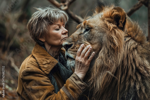 senior woman takes care of her lion.