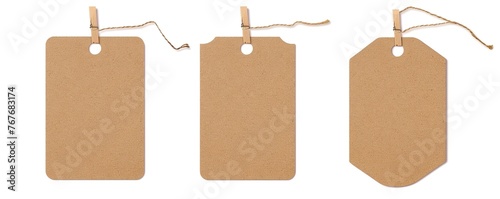Three tags hanging from a clothesline. The tags are brown and have a white background