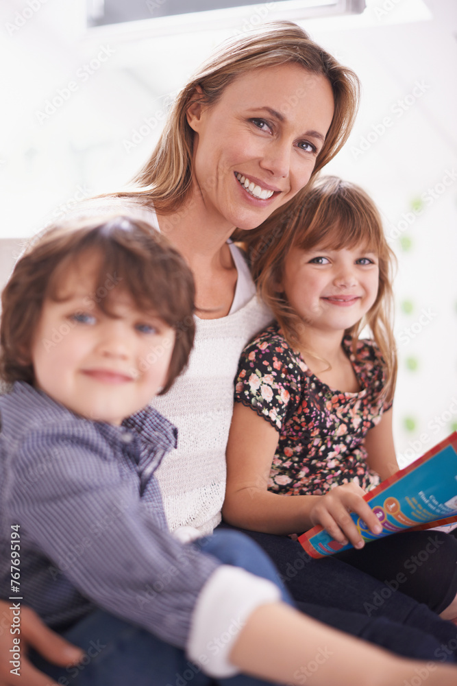 Portrait, mother and children on sofa reading book with bonding, teaching and learning together in home. Mom, son and daughter relax on couch with storytelling, smile and happy family in living room Portrait, mother and children on sofa reading book with bonding, teaching and learning together in home. Mom, son and daughter relax on couch with storytelling, smile and happy family in living room