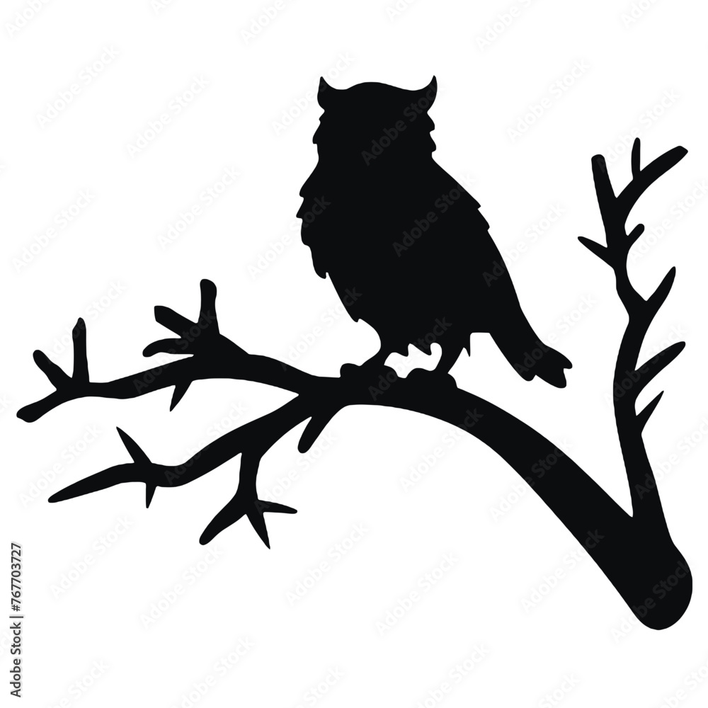 Fototapeta premium owl sitting on top of a tree branch Silhouette 