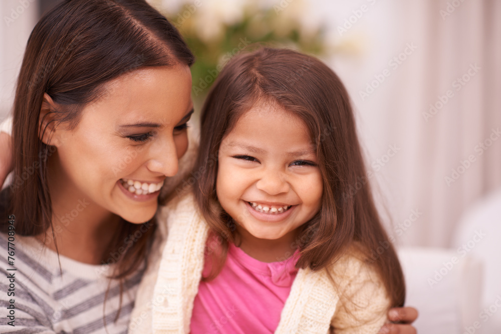 Portrait, mother and daughter with smile for hug in apartment with love, care and happiness. Home, mom and girl in lounge to relax on sofa or couch for bonding in living room of family house Portrait, mother and daughter with smile for hug in apartment with love, care and happiness. Home, mom and girl in lounge to relax on sofa or couch for bonding in living room of family house