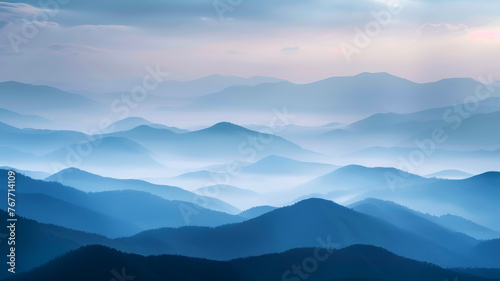 Tranquil Dawn Breaking Over Misty Mountain Ranges with Layers of Blue and Purple Hues © thanakrit