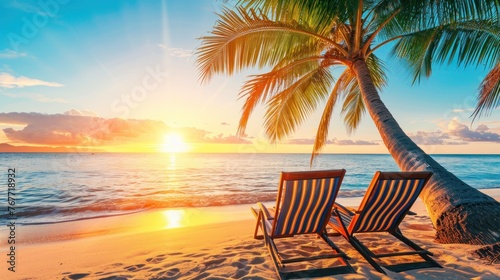 Beach chairs on tropical beach at beautiful sunset time.