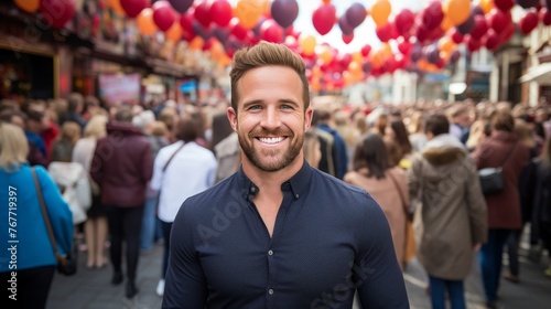 Smiling man at festive event, looking into camera with empty area for text and copyspace