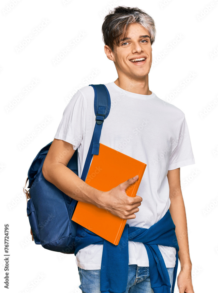 Young hispanic man wearing student backpack and holding books looking positive and happy standing and smiling with a confident smile showing teeth