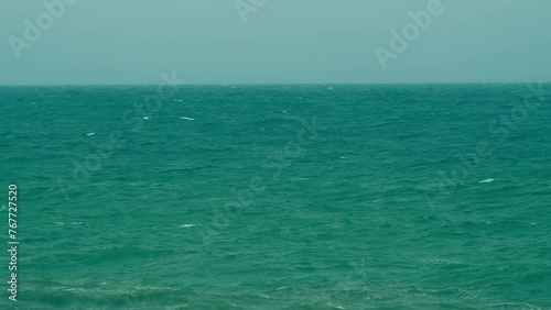 Very Big Wave Splashing. Ocean Shore Break In Front View. Stormy Sea With Big Blue Large Waves. photo
