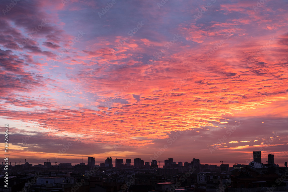 Spectacular sunrise with reddish tones of the city of Barcelona (SPAIN)