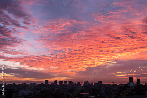 Spectacular sunrise with reddish tones of the city of Barcelona  SPAIN 