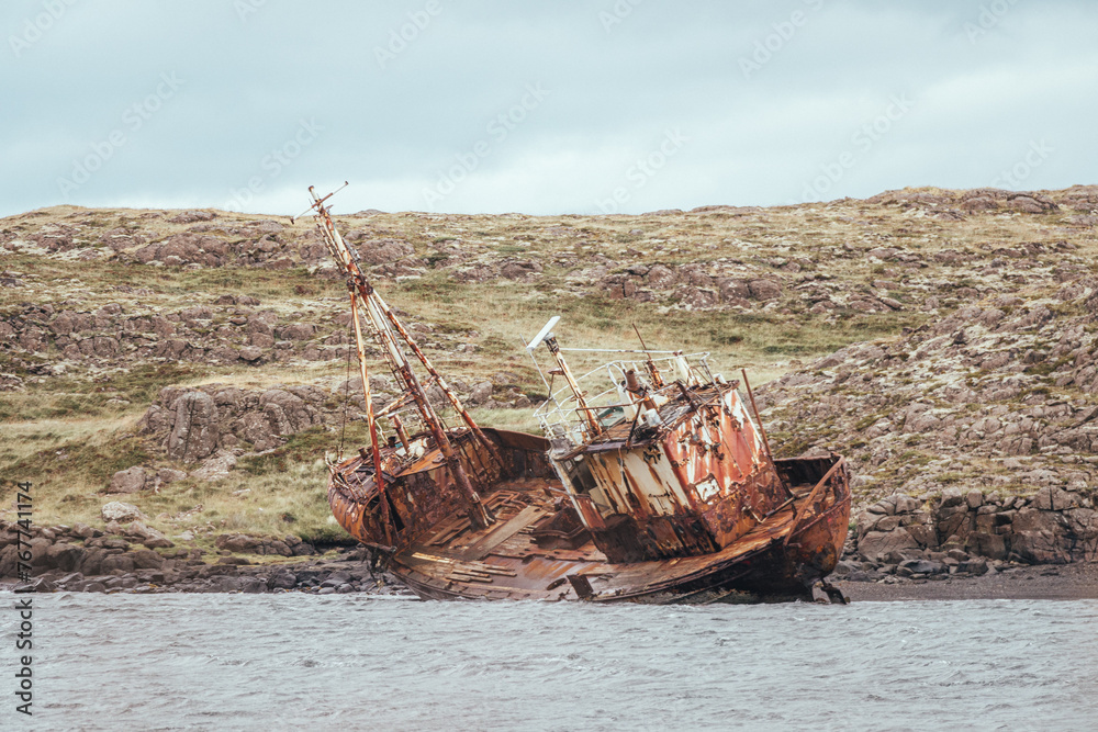 rustic shipwreck on icelandic coast