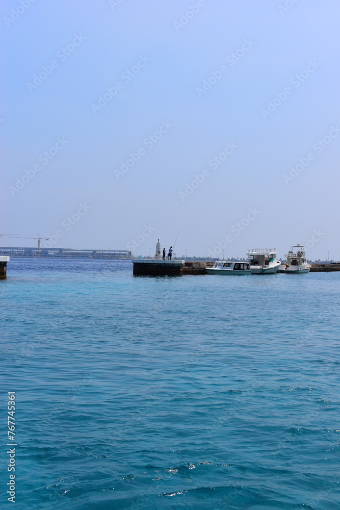 Maafushi Maldives - February 2022 : Beautiful turquoise waters on a hot sunny relaxing day. 