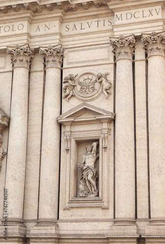 Sant'Andrea della Valle Basilica Facade Detail with Statue of Saint Sebastian in Rome, Italy