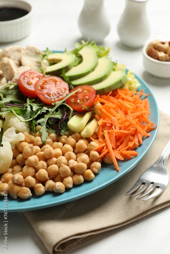 Balanced diet and healthy foods. Plate with different delicious products on white marble table, closeup Balanced diet and healthy foods. Plate with different delicious products on white marble table, closeup