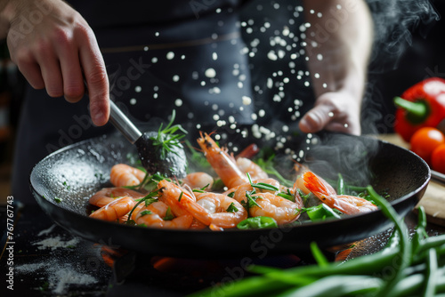 A person is cooking shrimp in a pan with a lot of steam coming out. The shrimp are being seasoned with herbs and spices