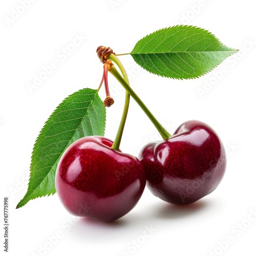 Three ripe cherries with stems and leaves, isolated on a white background.