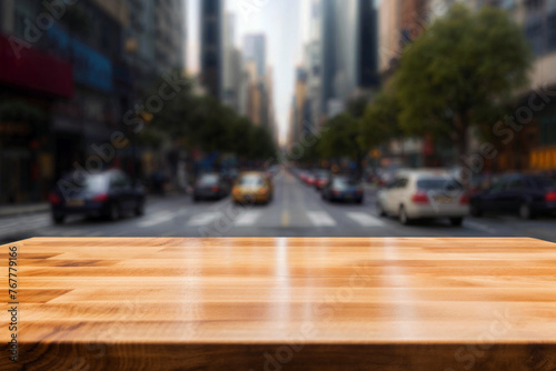 An empty wooden table with a blurred city street in the background. High quality photo