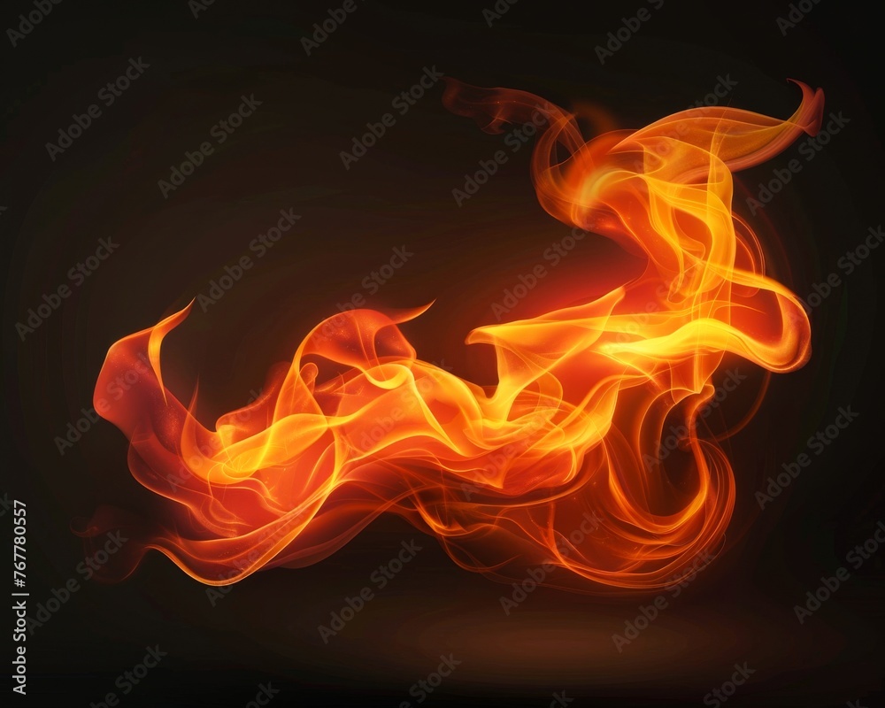 Fototapeta premium A fiery orange and red flame dancing on a dark background