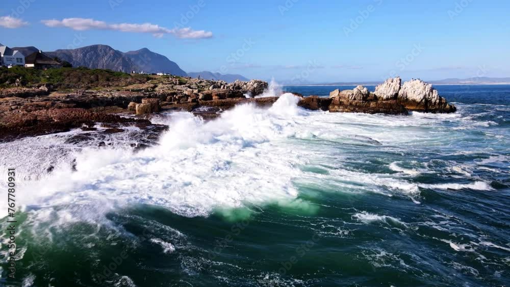 Atlantic ocean waves smash into rugged Hermanus shoreline. Aerial dolly Atlantic ocean waves smash into rugged Hermanus shoreline. Aerial dolly