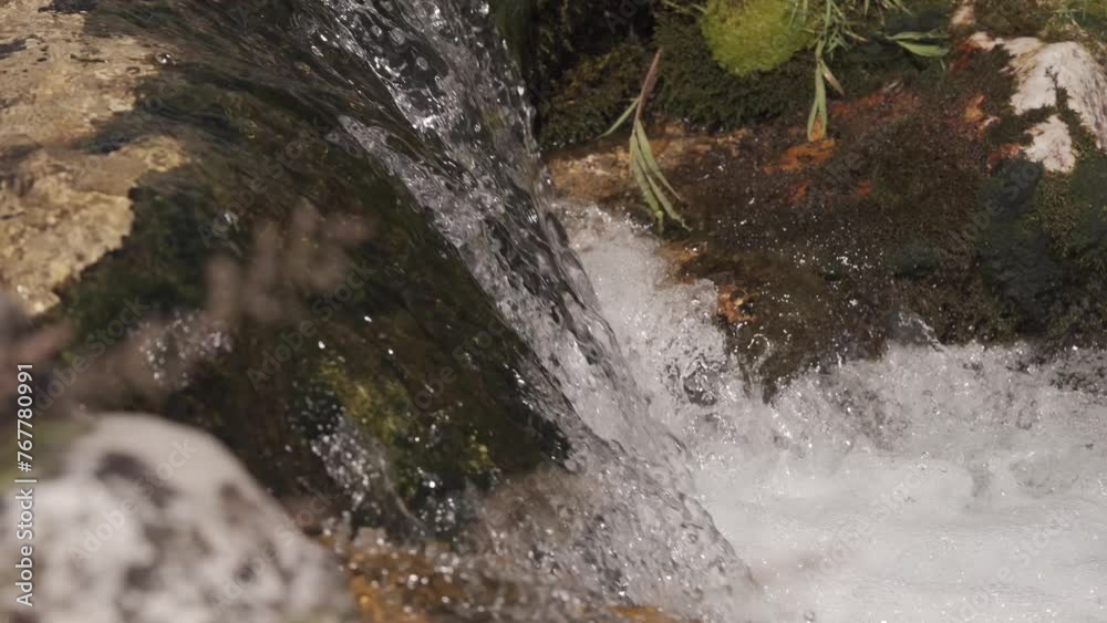 Torrent Of Fresh Water Flowing Over The Mossy Rocks - Close Up Torrent Of Fresh Water Flowing Over The Mossy Rocks - Close Up