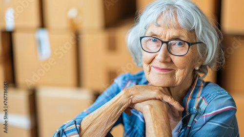 Elderly Woman Smiling with Cardboard Boxes