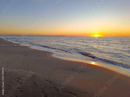 Seascape at sunset of the beach of Marina di Castagneto Carducci Tuscany Italy