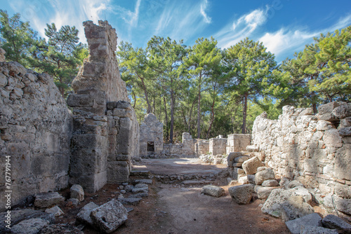 Phaselis Ancient City in Kemer of Antalya. Glorious beaches, calm sea, fab snorkelling and all set within ancient ruins that set the imagination. The charming historical place a the tranquil beach. photo