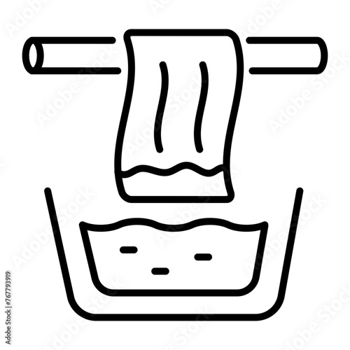 A handy line icon showing dyeing clothes 