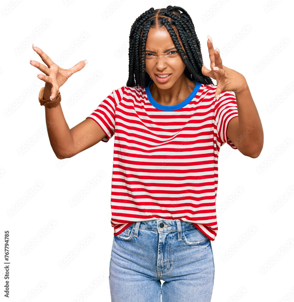 Beautiful hispanic woman wearing casual clothes shouting frustrated with rage, hands trying to strangle, yelling mad Beautiful hispanic woman wearing casual clothes shouting frustrated with rage, hands trying to strangle, yelling mad