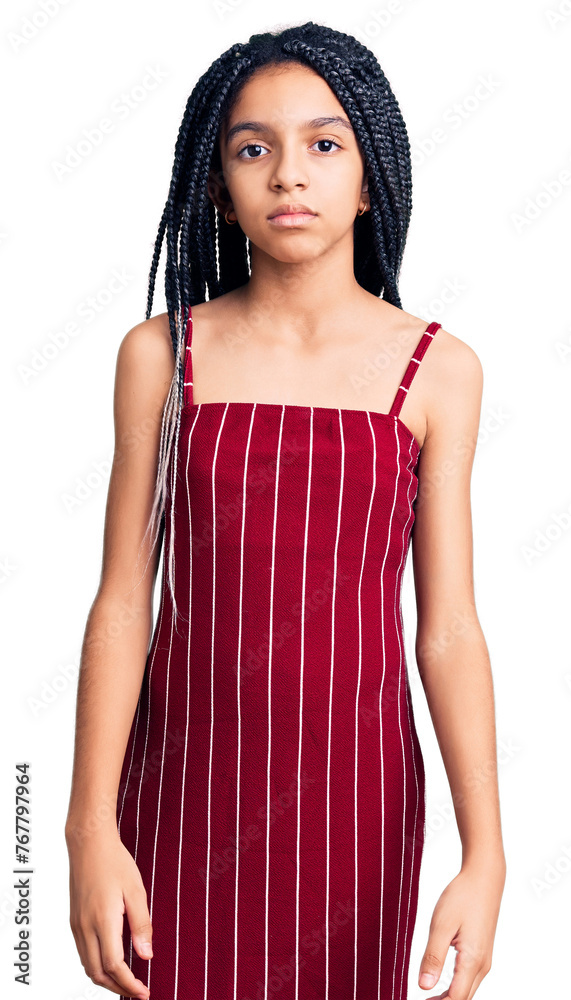 Cute african american girl wearing casual clothes with serious expression on face. simple and natural looking at the camera. Cute african american girl wearing casual clothes with serious expression on face. simple and natural looking at the camera.
