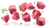 Diced beef cuts levitating in air on white background. File contains clipping paths.