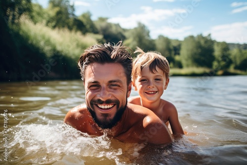 A man and a boy are in the water, smiling and enjoying themselves