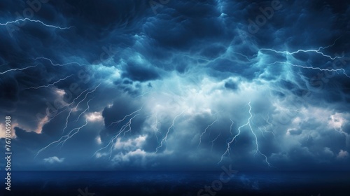 Blurred blue sky with clouds The sky has dramatic storms and dark clouds. Lightning flashes above the night sky.